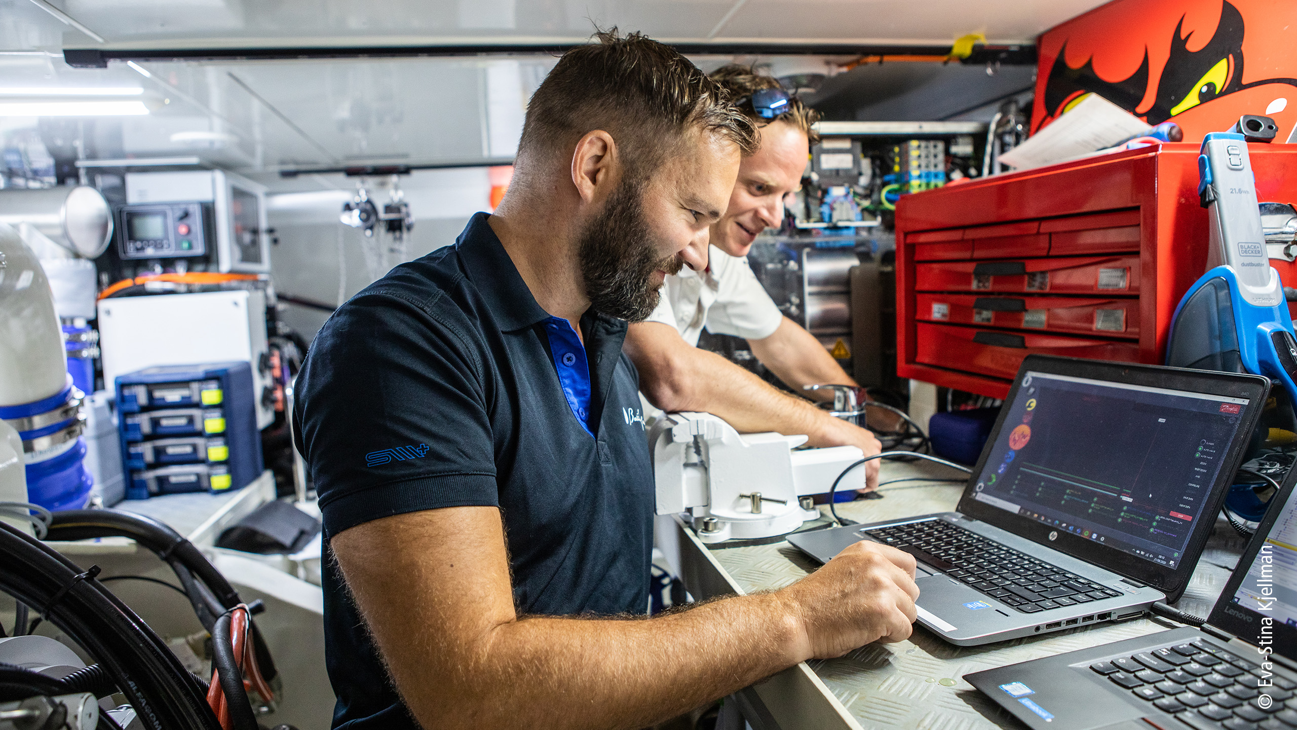 Mikael Johansson (foreground), senior automation engineer at Baltic Yachts: “We still have more ideas about where and how else we want to exploit the advantages of PC-based control on our yachts.”