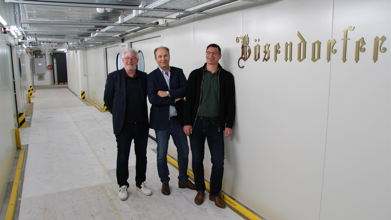 Rainer Berkmann, head of sales and technology at Berkmann Lackieranlagen; Thomas Broukal, technical and manufacturing director at Bösendorfer Klavierfabrik; and Ralph Schmoll, technical manager at Berkmann Lackieranlagen (left to right). 