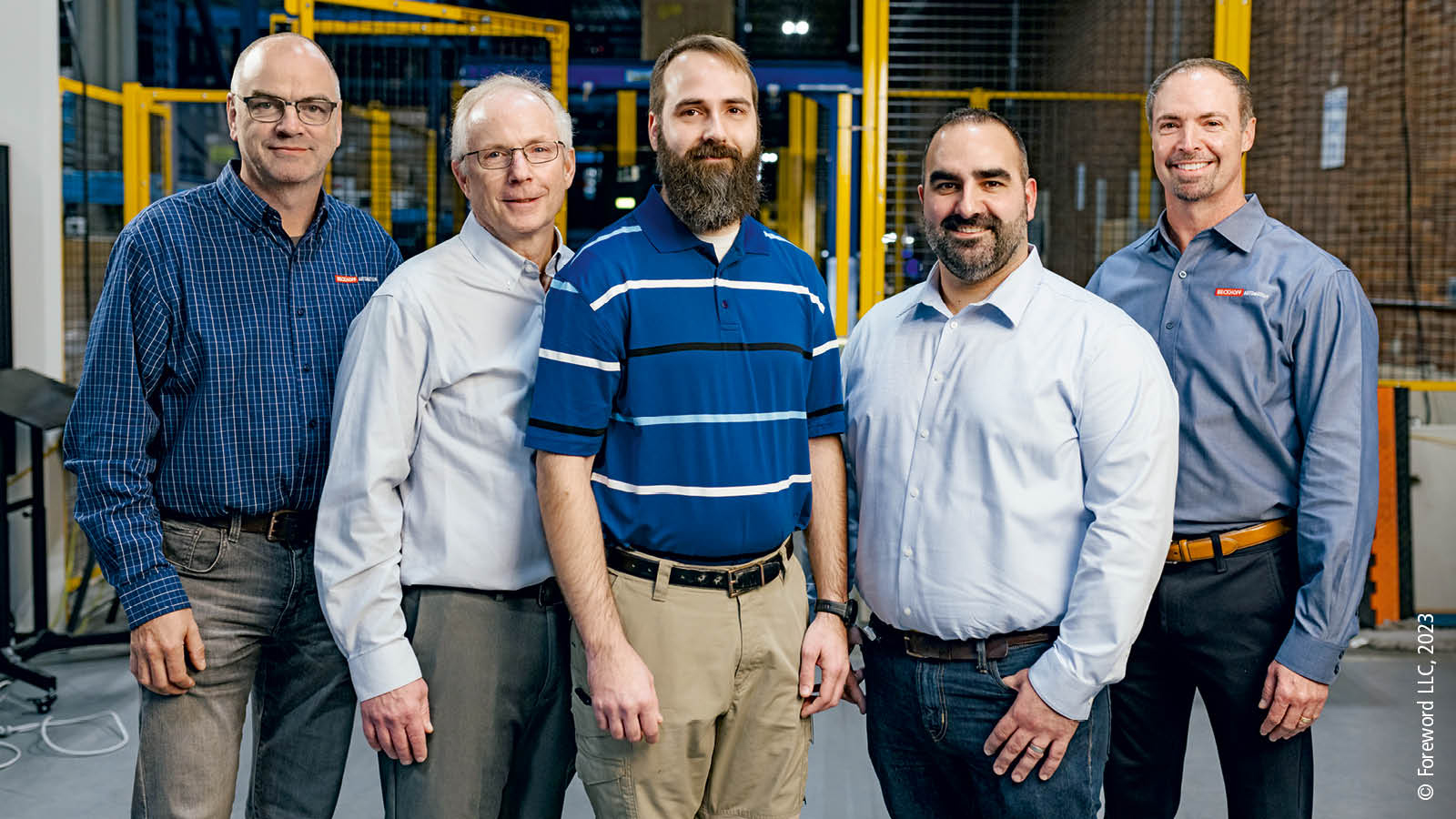 Automation and robotics experts gather at the Boston Dynamics test facility: (from left) Gilbert Petersen, Intralogistics Industry Application Specialist at Beckhoff; Brian Buck, Regional Sales Manager at Beckhoff; Matthew Meduna, Technical Director of Hardware Engineering, Stretch at Boston Dynamics; Eric Landry, Director, Supply Chain at Boston Dynamics; and Doug Schuchart, Global Material Handling and Intralogistics Manager at Beckhoff. 