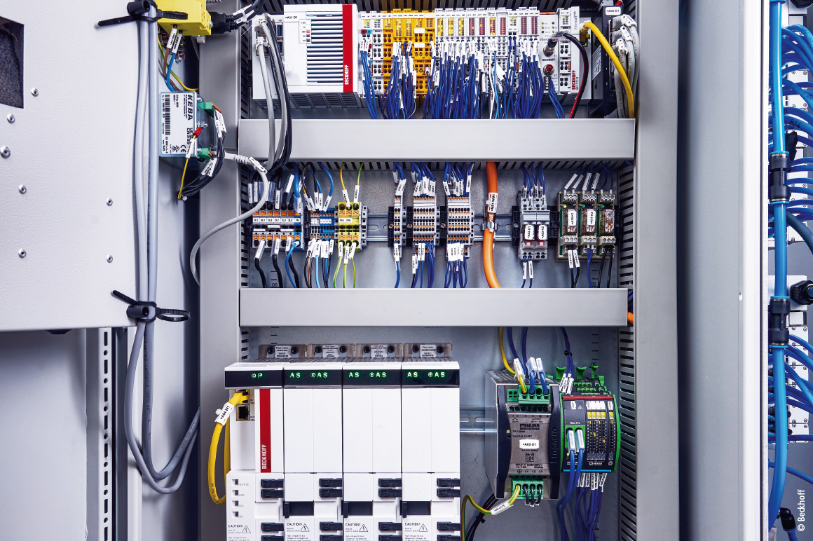 Control cabinet of the mySaw ring sawing machine with the CX5240 Embedded PC and the connected EtherCAT and TwinSAFE Terminals (top) and the AX8000 multi-axis servo system (bottom)