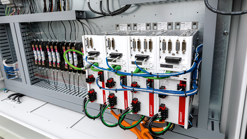 AX5000 series Servo Drives from Beckhoff power all axes of motion with space-saving One Cable Technology that provides power and position feedback in a single cable. 