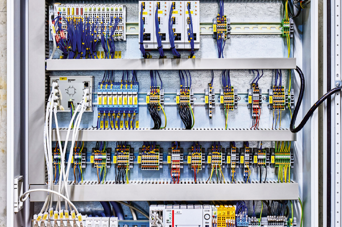 The control cabinet with the CX20x2 Embedded PC (below) for remote vehicle control and the interface with the building automation system is located in the basement of the test bench.