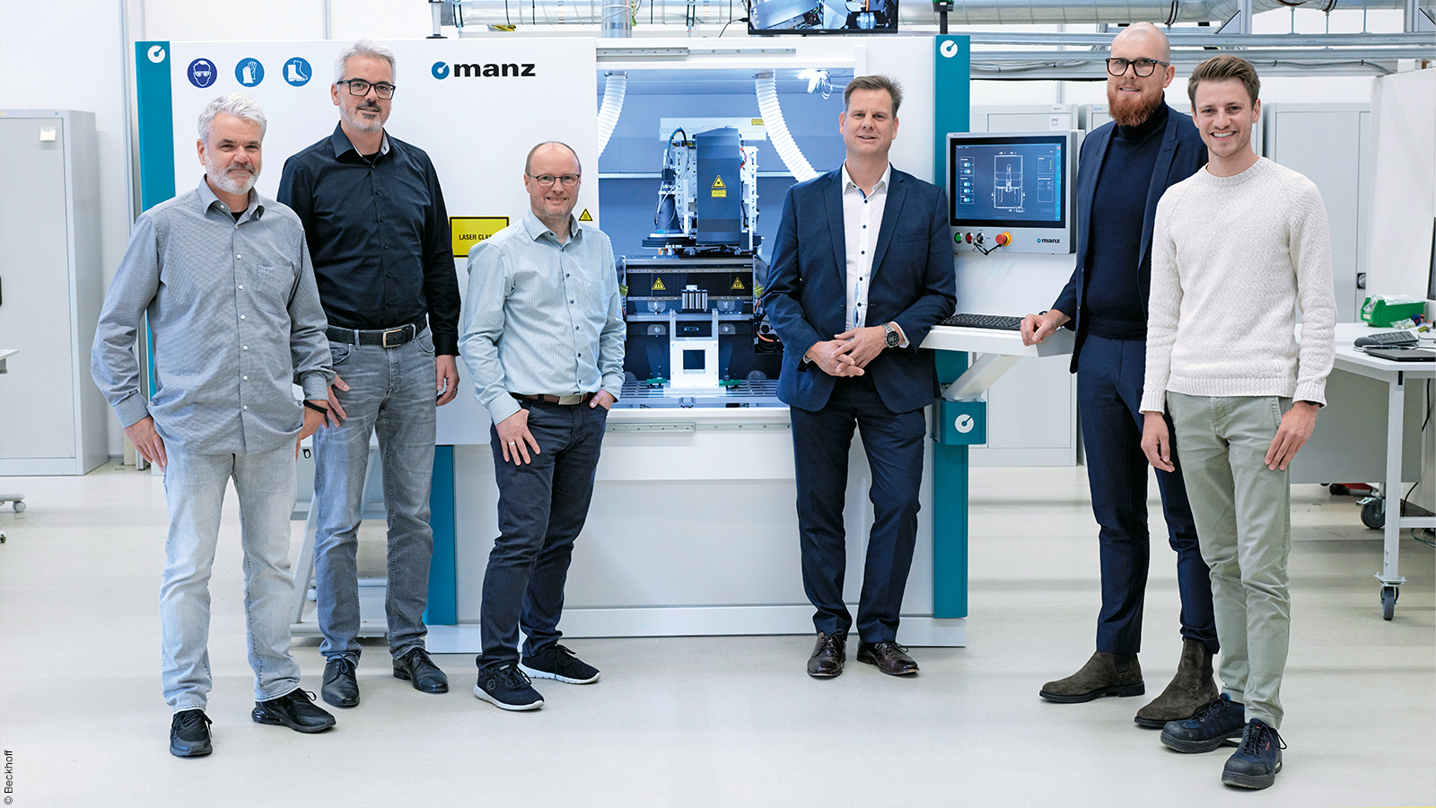 The project participants in front of the BLS 500 (from left to right): Oliver Heilig, sales and system consulting at Beckhoff, Axel Bartmann, Director Marketing and Corporate Communications at Manz, Stephan Lausterer, Head of Software Core Design and Product Development at Manz, Jörg Rottkord and Tilman Plaß, both automotive industry managers at Beckhoff, and Felix Röckel, process developer at Manz 