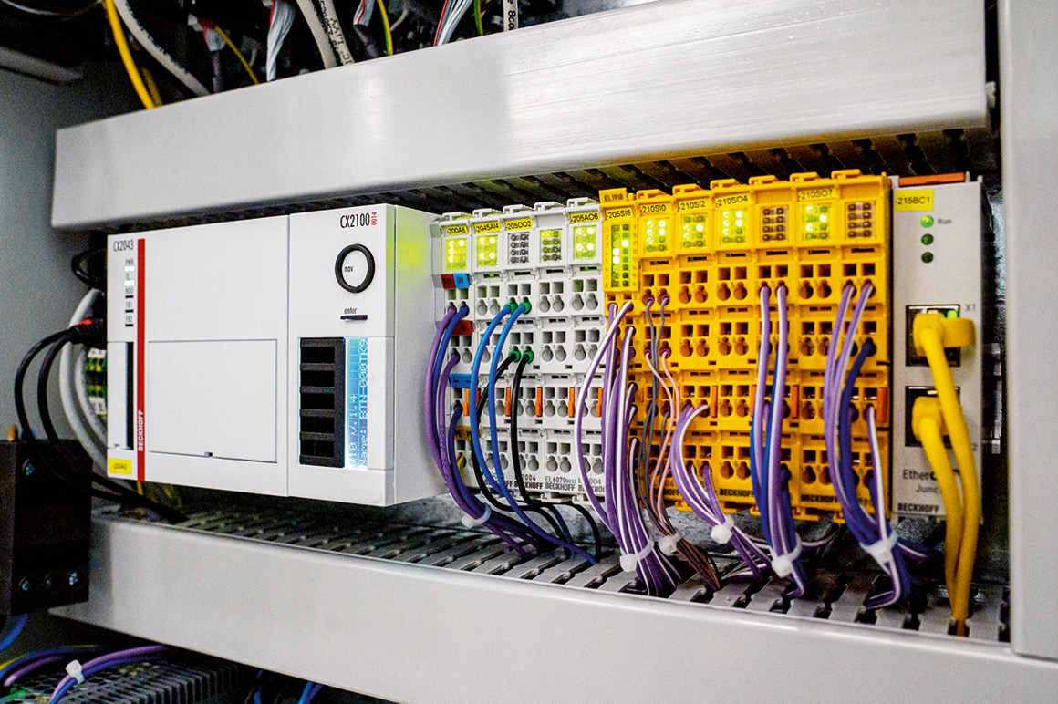 The CX2043 Embedded PC and, directly adjacent, a 130W CX2100-0014 power supply and EtherCAT and TwinSAFE Terminals provide the control hardware for this MIRACLE II project.